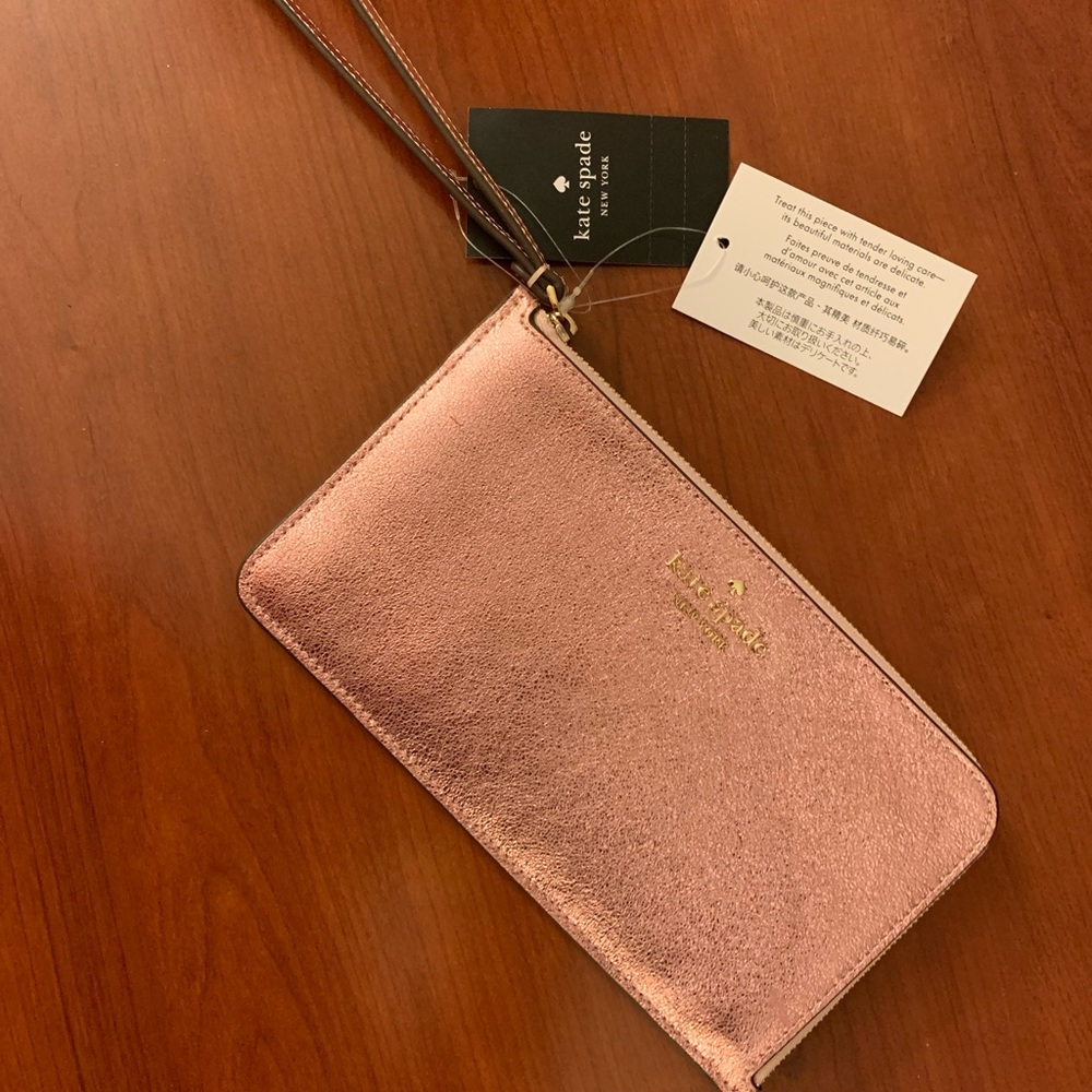 Kate Spade metallic pink wristlet